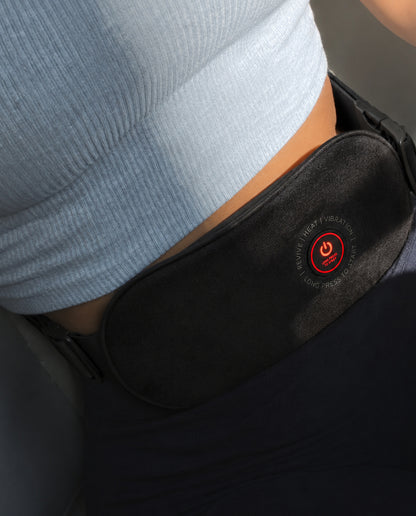 Close-up of the SŌLA heat wrap worn under a fitted top